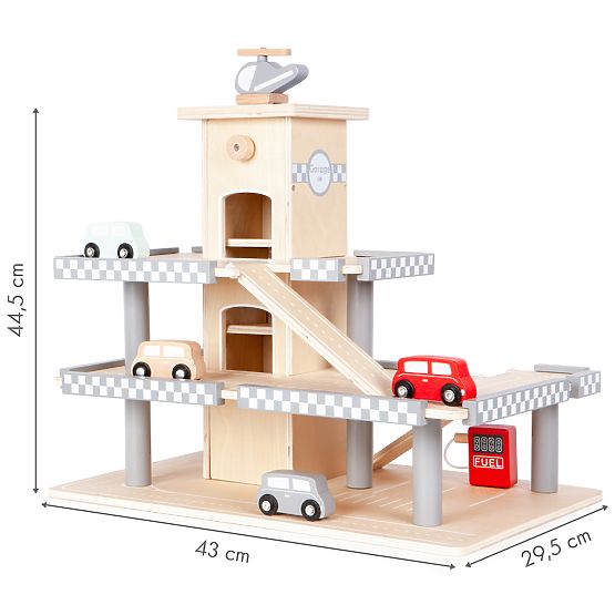 Alex's three-storey garage with a lift, cars and a helicopter