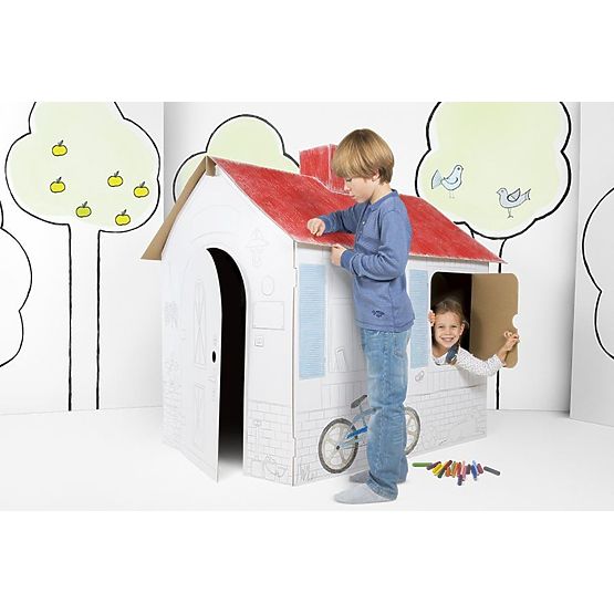 Children's cardboard house with a chimney