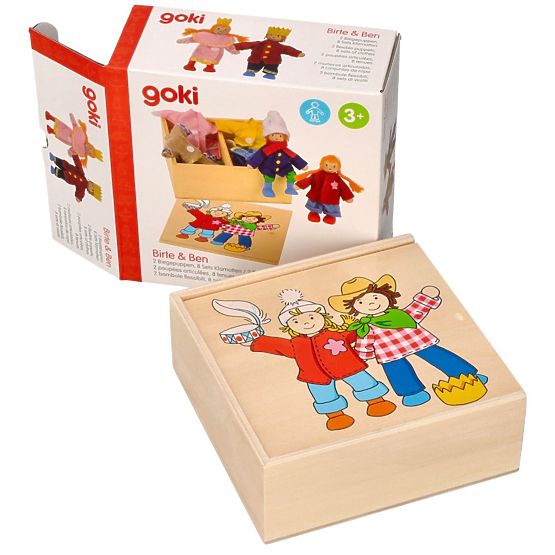 Dressing wooden dolls