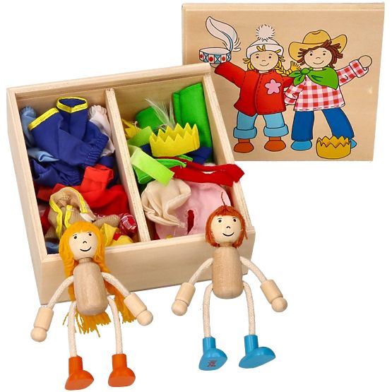 Dressing wooden dolls