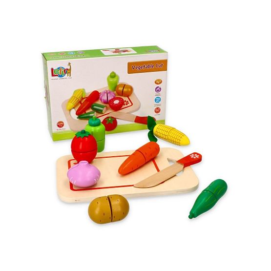 Wooden vegetables with a cutting board