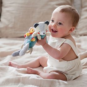 Petit Collage Whistling teddy bear rattle